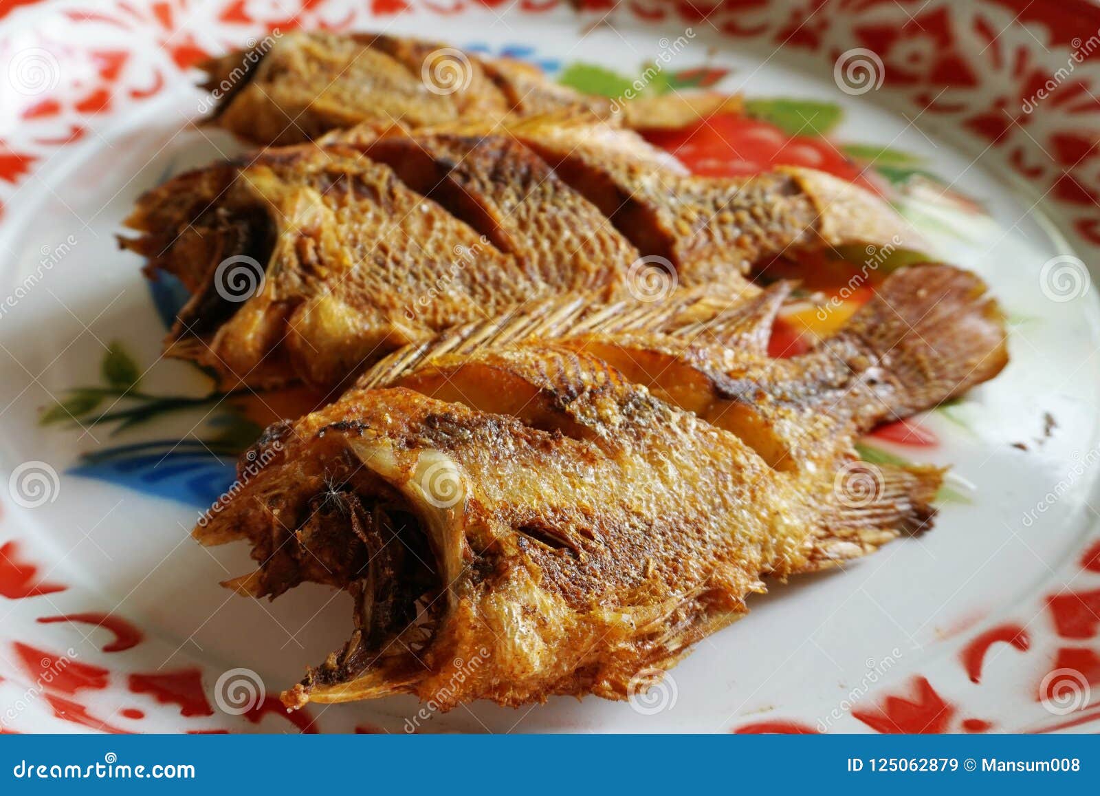 Fried fish on plate stock image. Image of meal, dish 125062879
