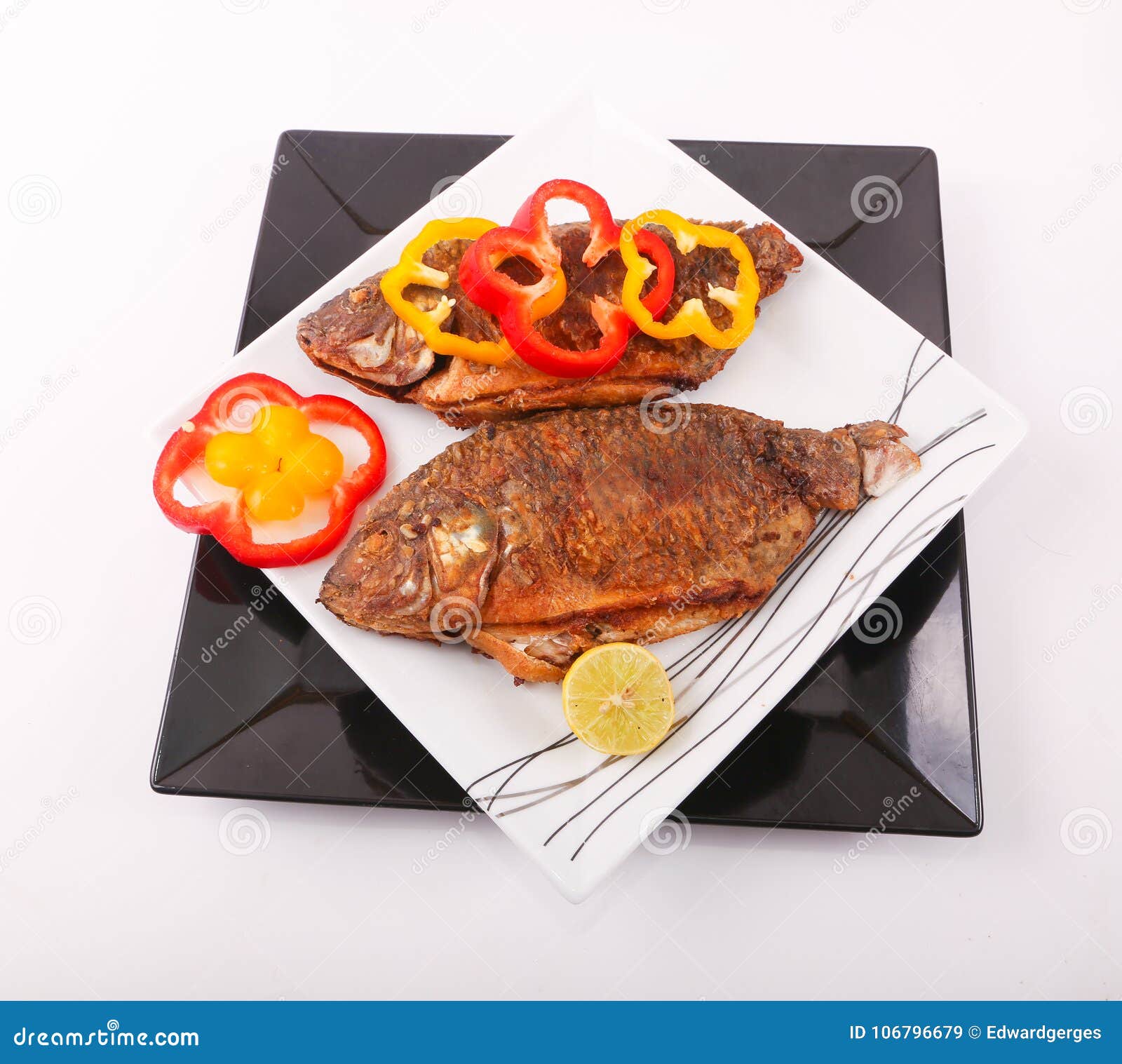 Fried fish plate stock image. Image of leaf, food, colored 106796679