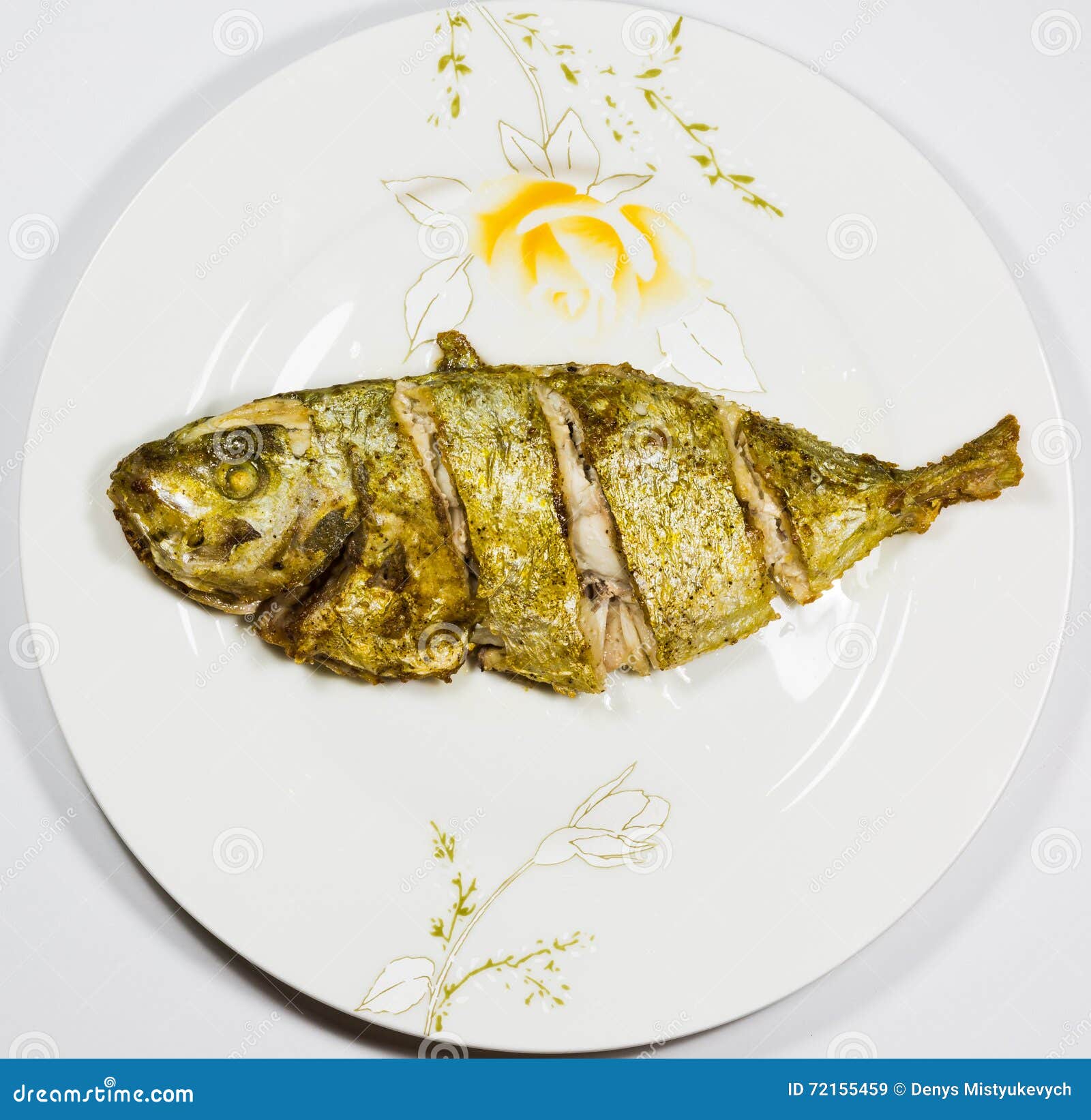 Fried fish on the plate stock image. Image of kitchen 72155459