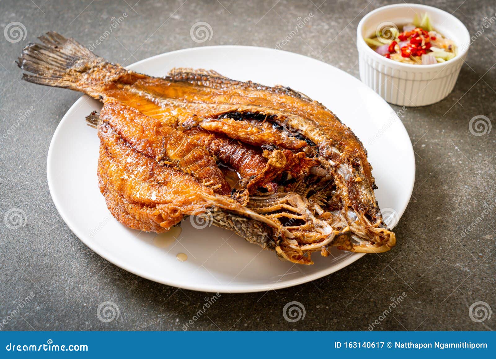 Fried Fish with Fish Sauce stock image. Image of chinese 163140617