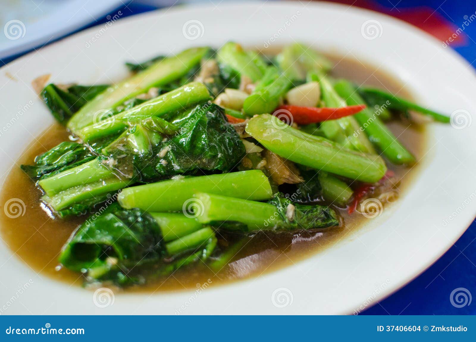 Fried kale and vegetables stock photo. Image of oyster 37406604