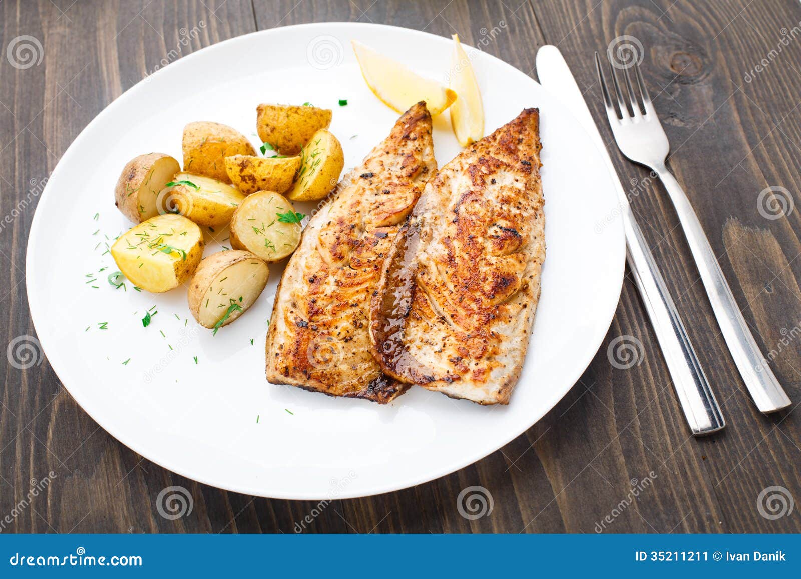 Fried Mackerel with Baked Potato Stock Image Image of plate, meal