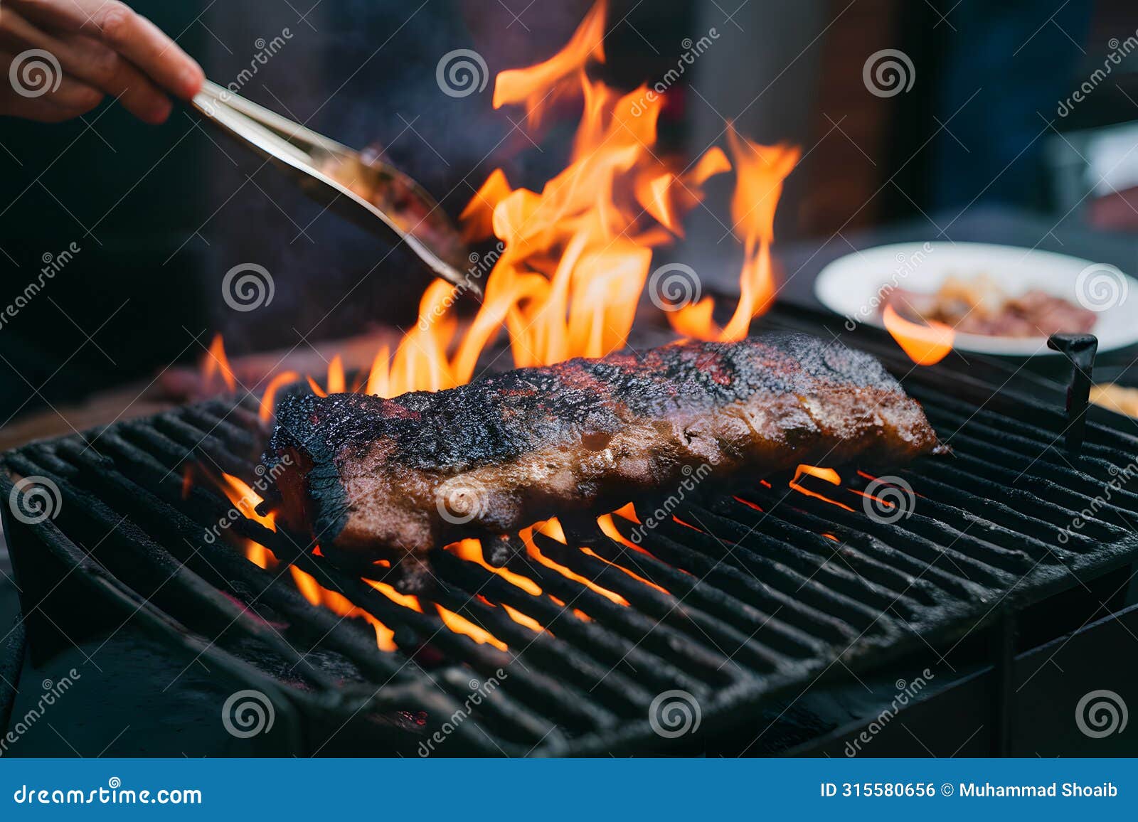 fried pork ribs grilling on open flame, flavorful street food