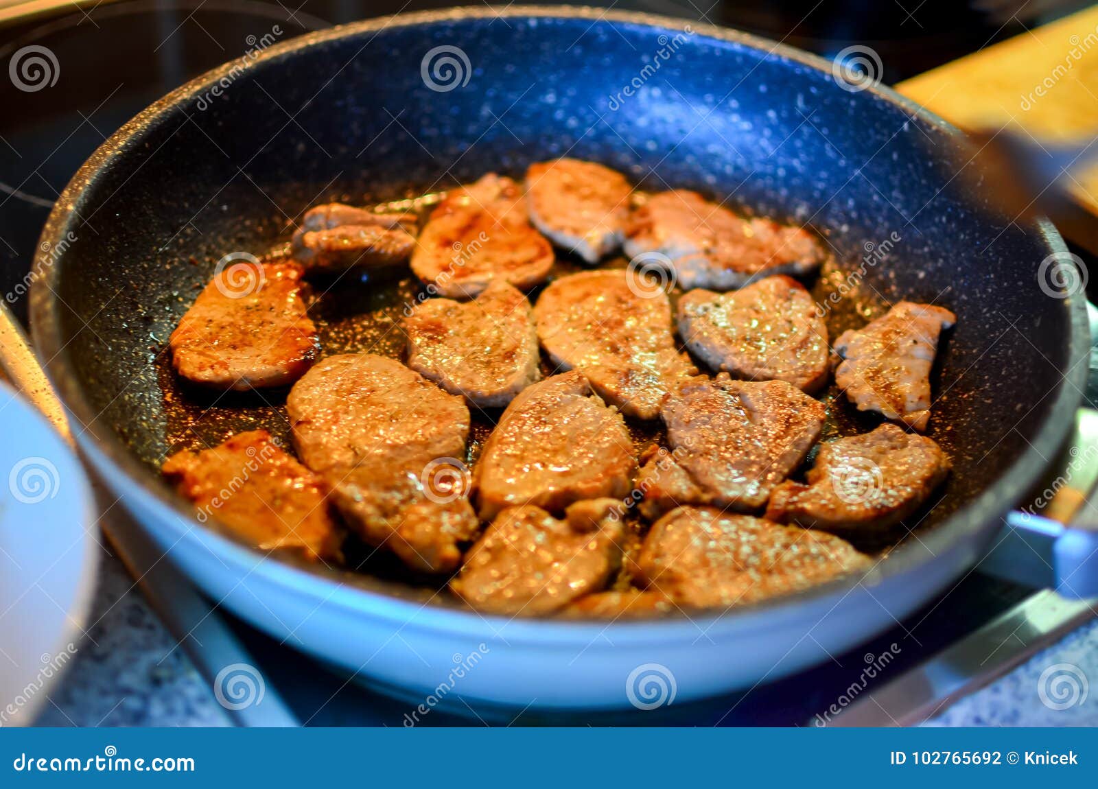 Fried pork tenderloin stock photo. Image of cooker, fried 102765692