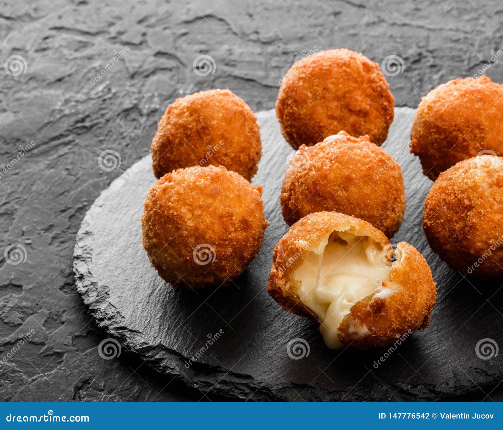 Two Potato Balls Are Partially Eaten With Cheese In The Middle Background,  Croquette On White Background, Hd Photography Photo Background Image And  Wallpaper for Free Download