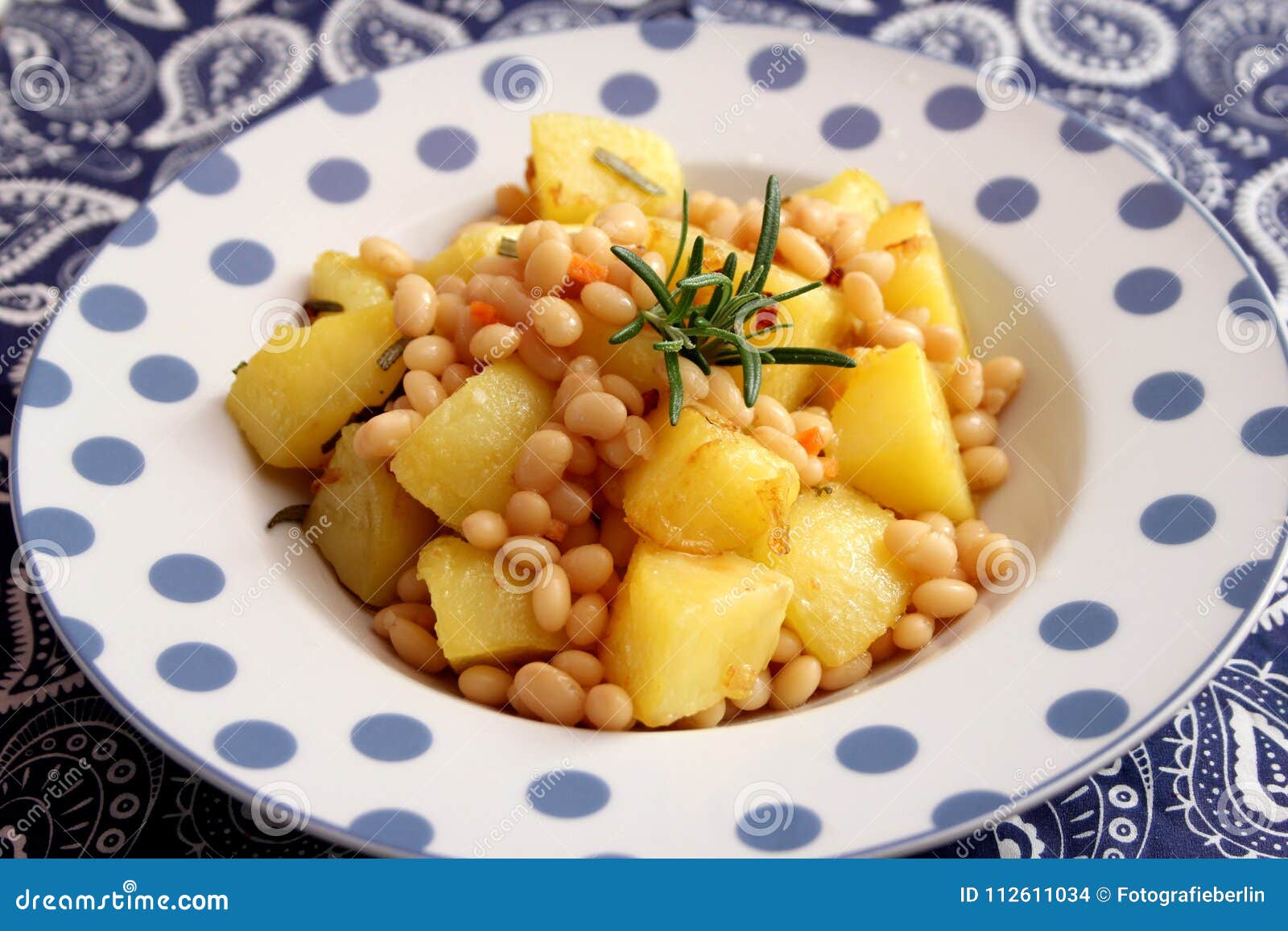 Fried potatoes with beans stock photo. Image of white 112611034
