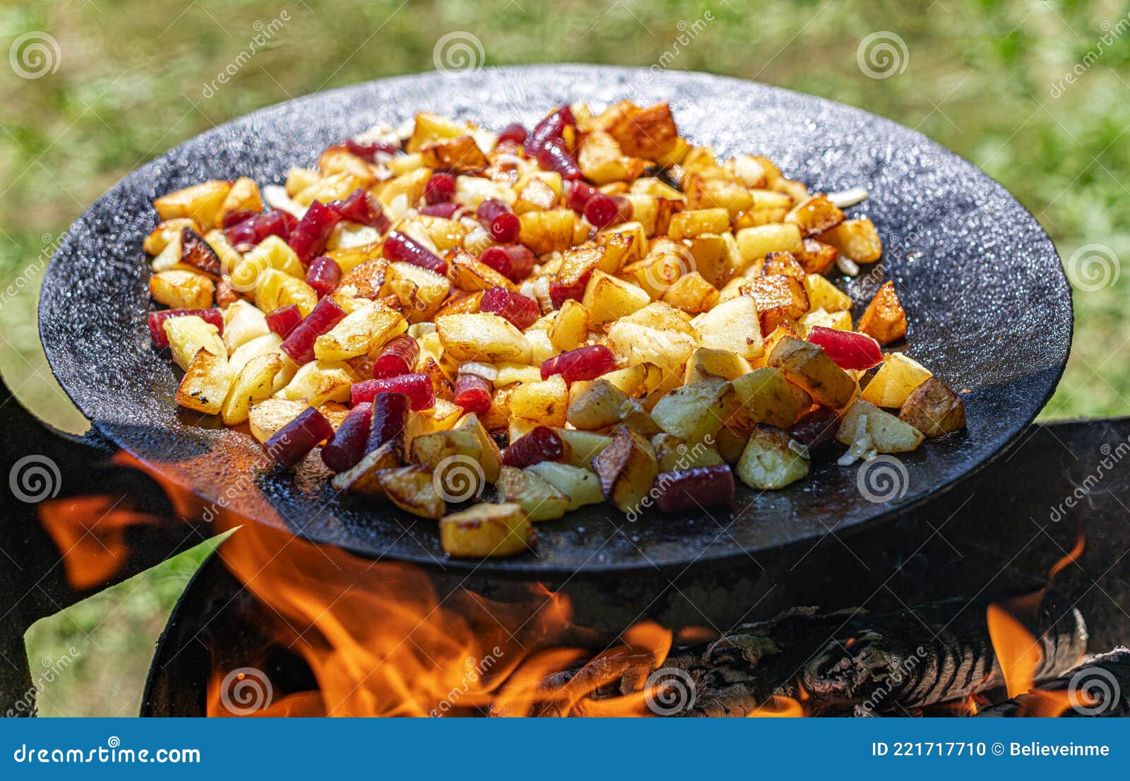 Fried Potatoes on a Fire or Grill. Stock Photo Image of skillet