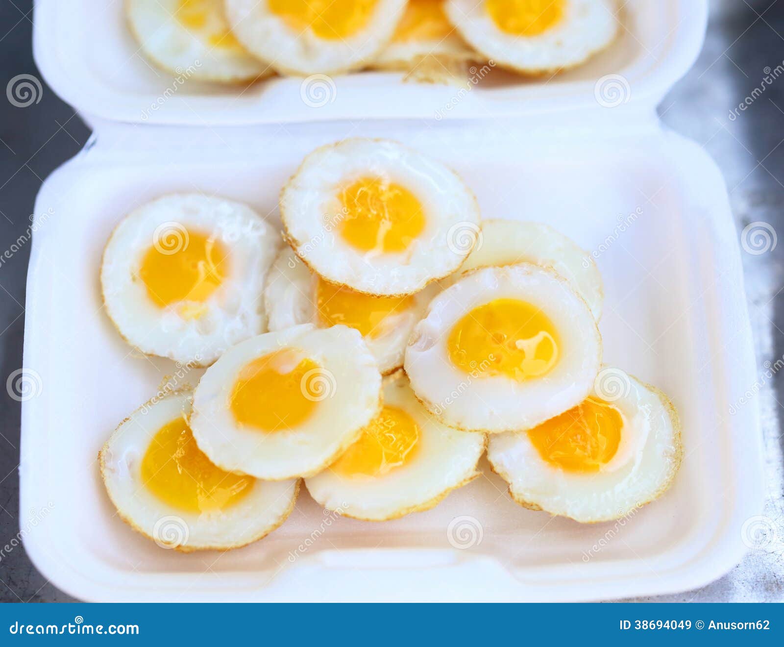 Fried Quail Eggs Cooking On Frying Pan, Thai Style Snack, Thailand