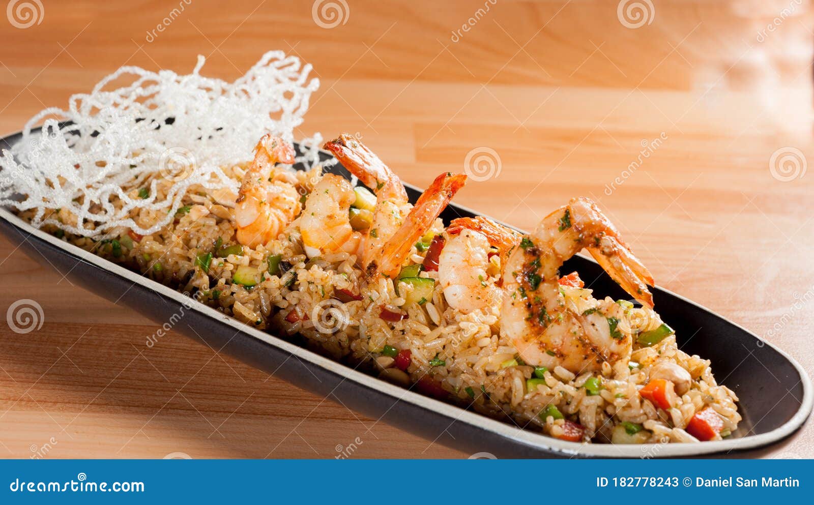 fried rice with calamari - asian food. chaufa rice with shrimp