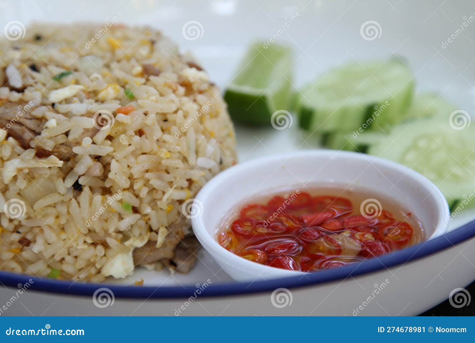 Fried Rice with Cucumber, Lime and Chilli Fish Sauce Stock Image