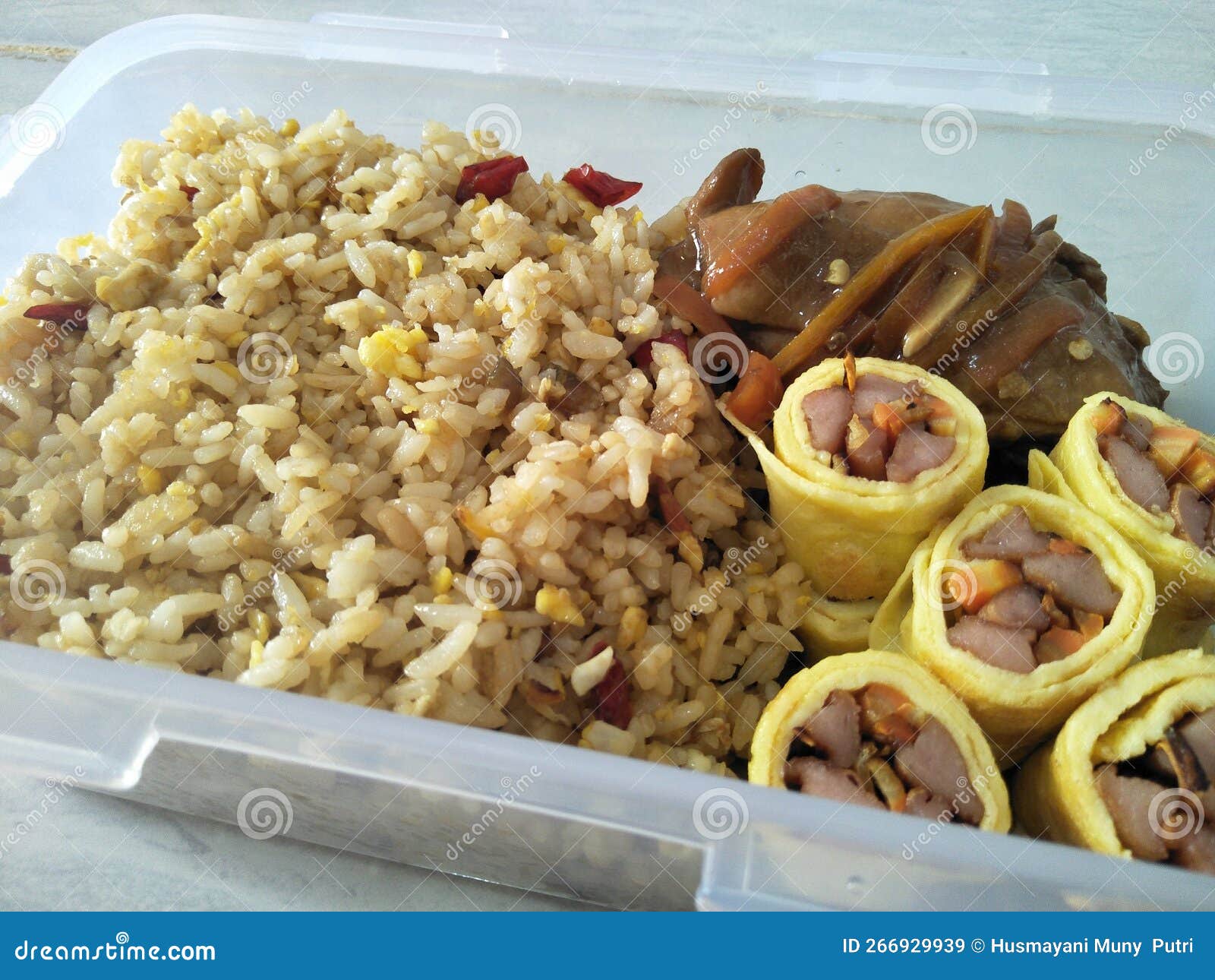 Fried Rice with Omelette Roll and Soy Sauce Chicken for Lunch Stock