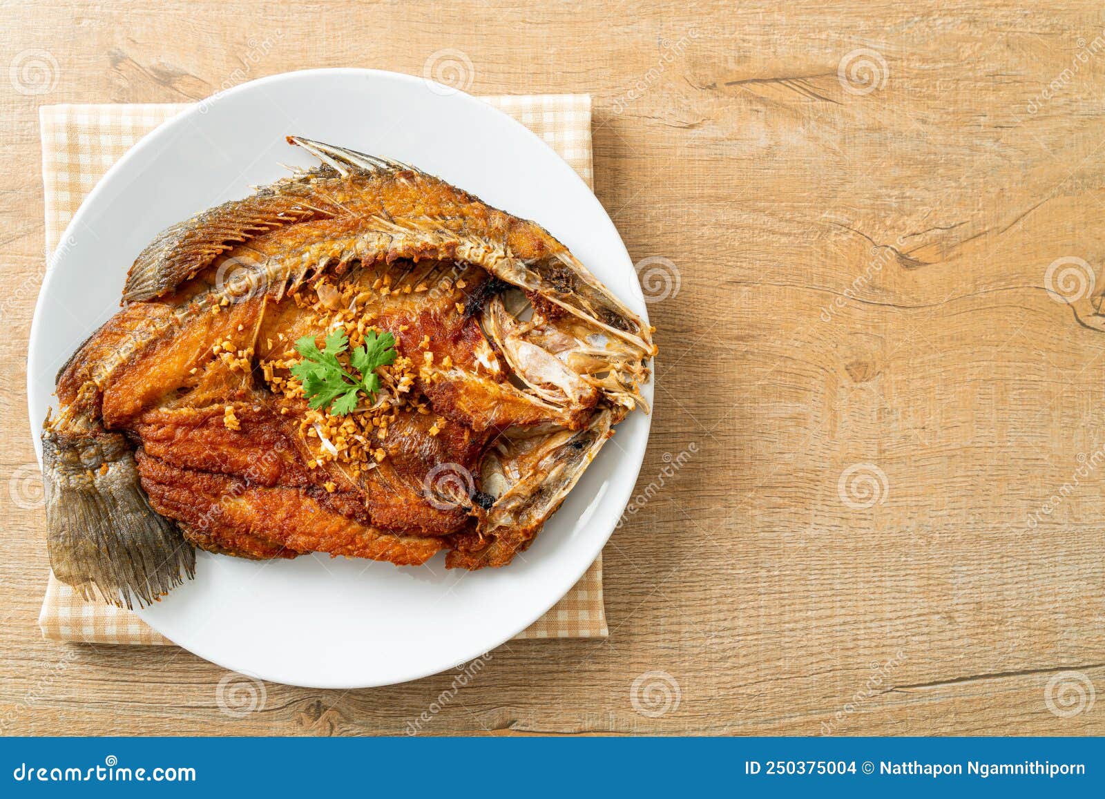Fried Sea Bass Fish with Garlic Stock Photo Image of healthy, cuisine
