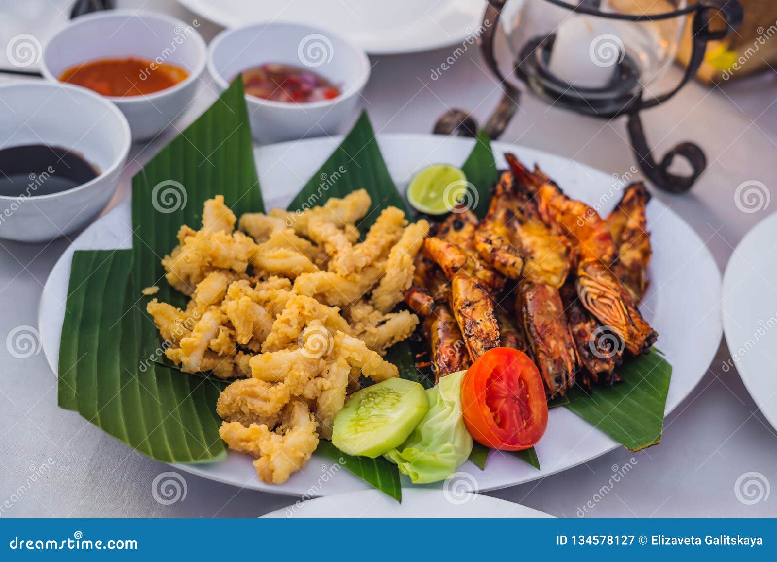 Fried Seafood for Lunch in Jimbaran Bay, Bali Stock Image - Image of