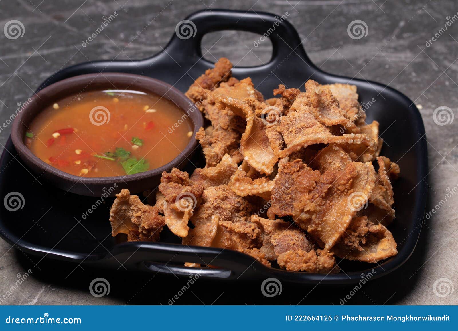 Fried Sliced Pork with Fish Sauce and Spicy Sauce Stock Photo Image
