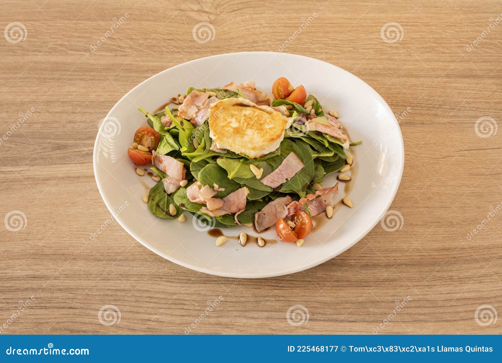 Fried Spinach and Goat Cheese Salad with Fried Bacon, Pine Nuts and