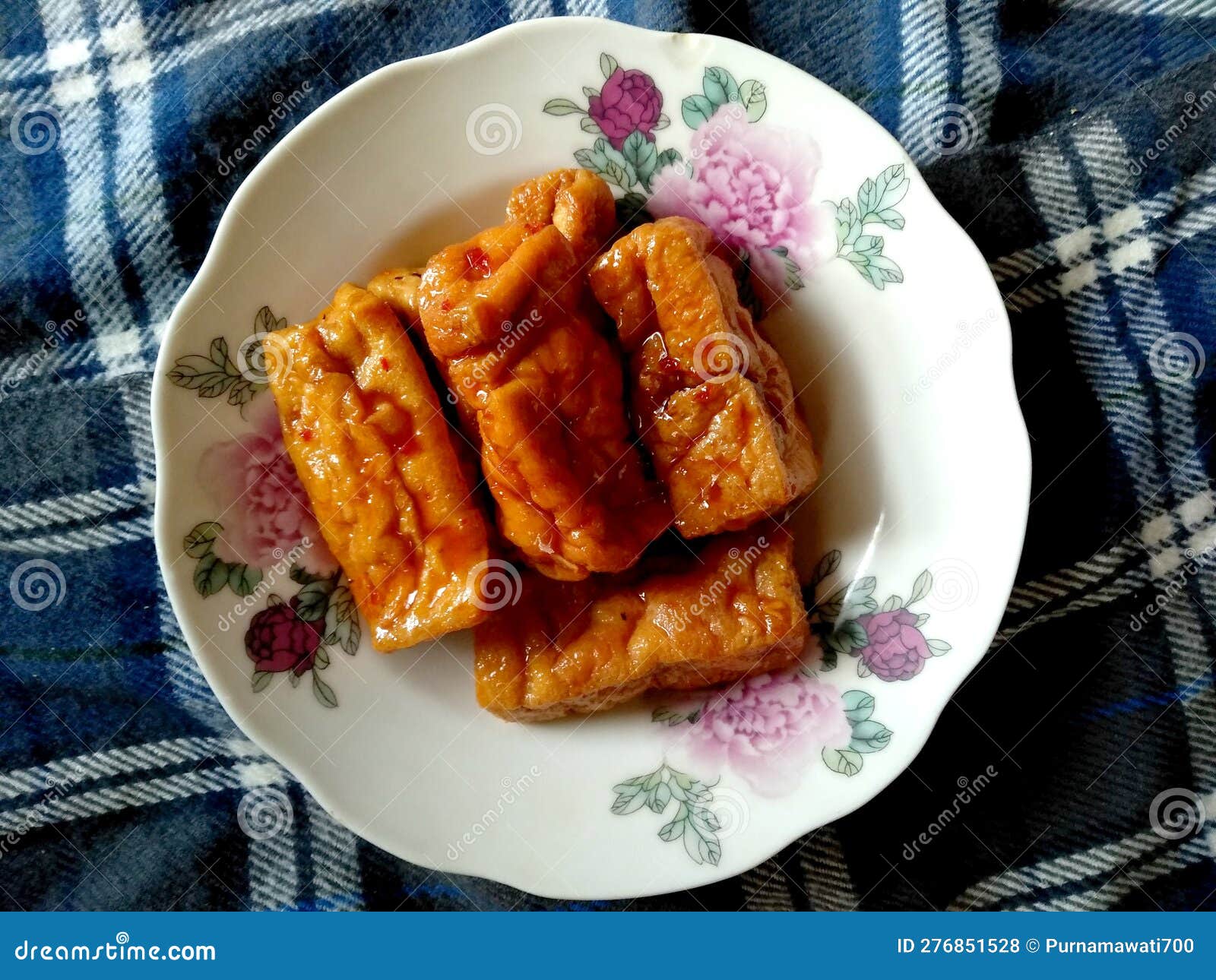 Tofu with Sweet Sauce or Masakan Tahu Bumbu Manis in White Plate Stock