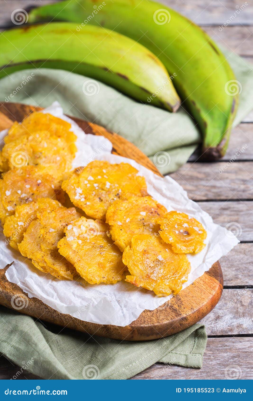 fried tostones, green plantains, bananas with guacamole sauce