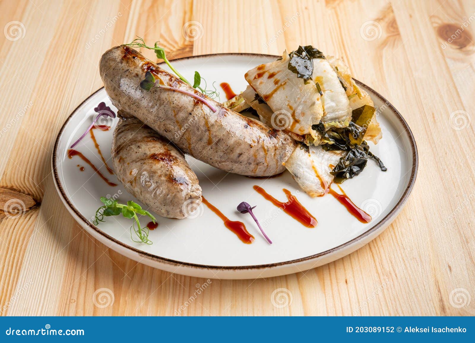 Fried Weisswurst White Veal Sausage with Marinated Cabbage and Sea Wed