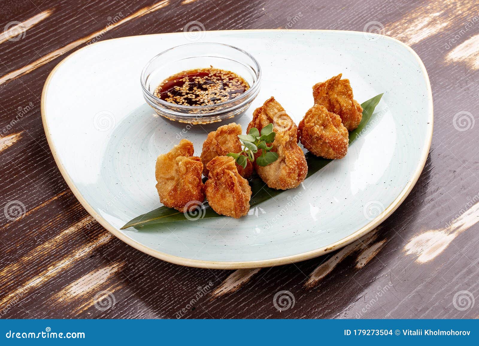 Fried Wontons with Soy Sauce Served on a Bamboo Leaf Stock Photo Image of cantonese, color