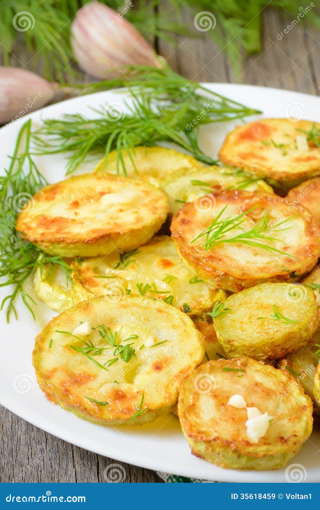 Fried zucchini with dill stock image. Image of meal, health 35618459