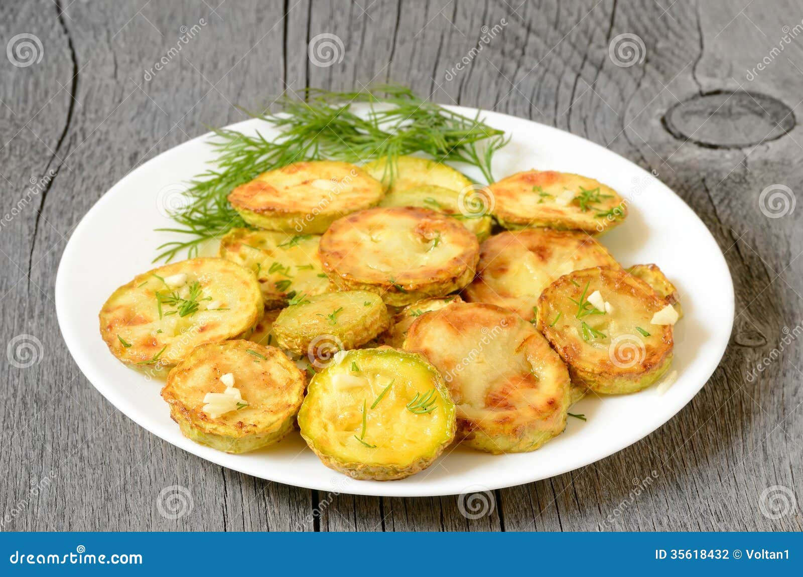 Fried zucchini with dill stock photo. Image of appetizer 35618432