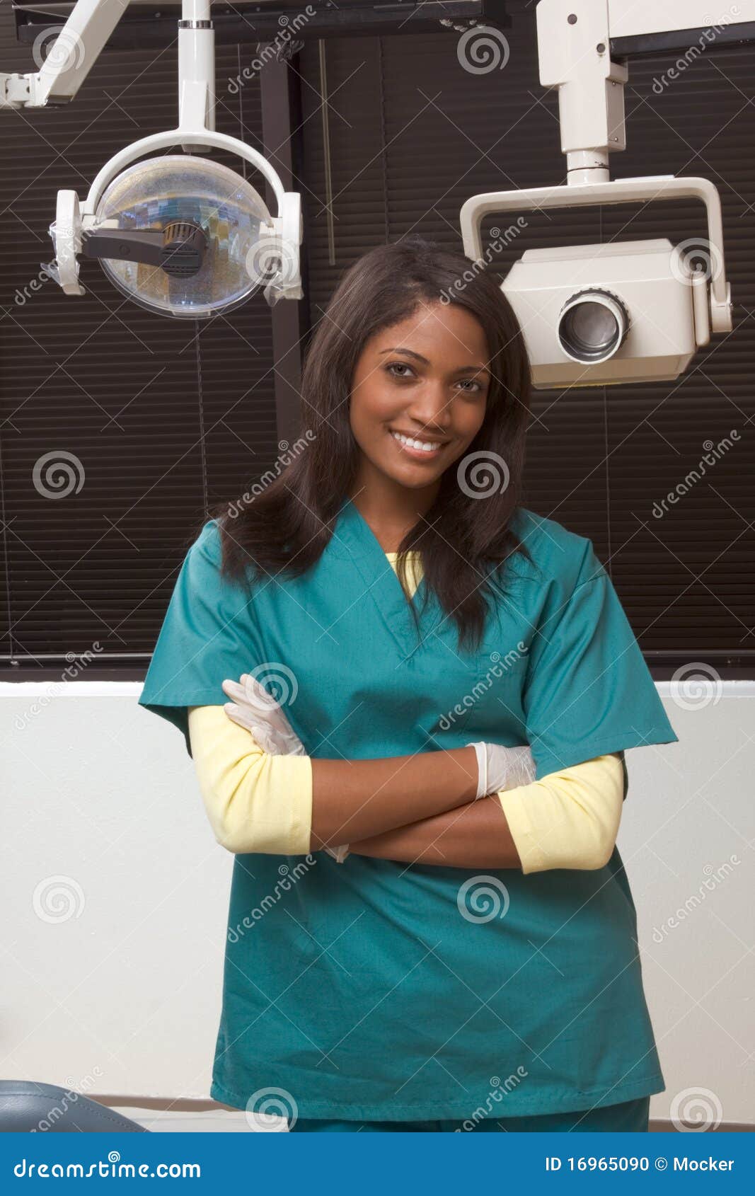 friendly african-american dentist woman in office