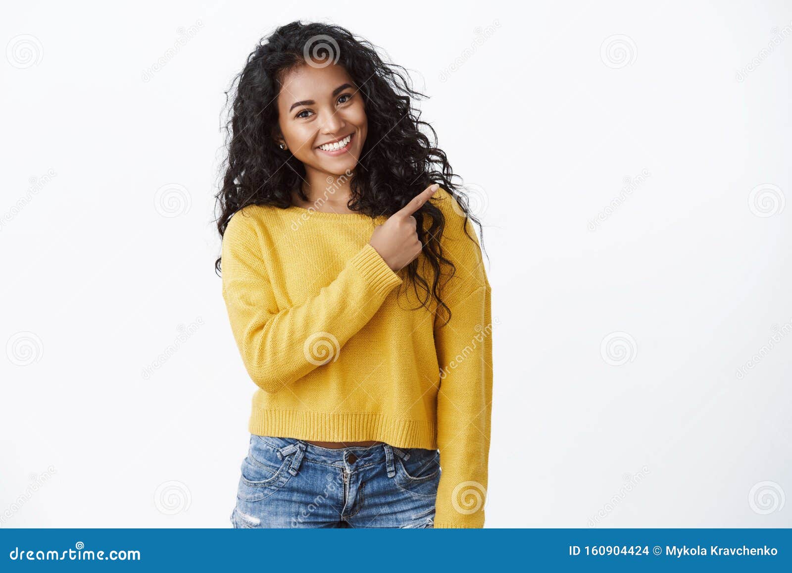 friendly cheerful female student study abroad showing friend around, pointing upper right corner, tilt head lovely