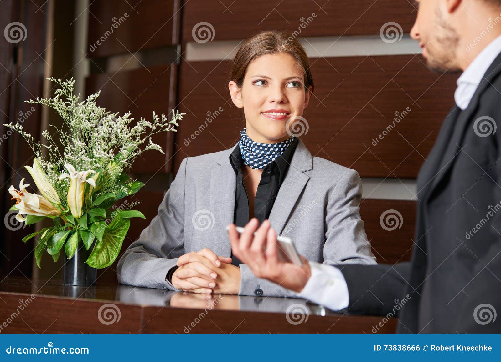 Friendly Hotel Receptionist and Business Guest Stock Photo Image of