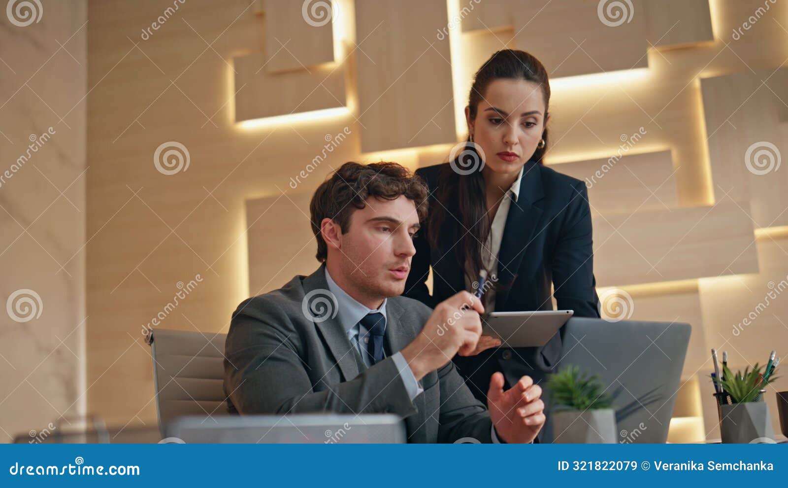 friendly team work together looking computer office closeup. colleagues talking