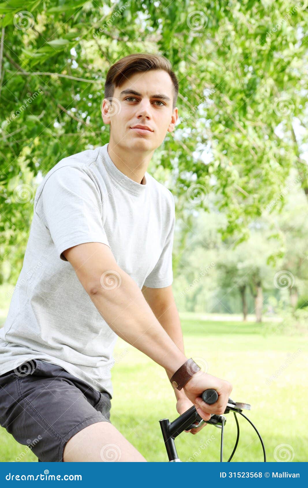 Friendly Young Guy on Bicycle Stock Photo - FrienDly Young Guy Bicycle Portrait Bike 31523568