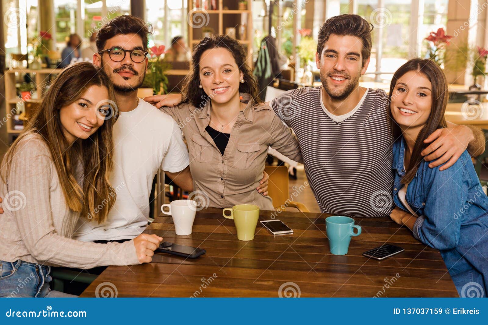 Friends at the cafe stock image. Image of casual, laughing 137037159