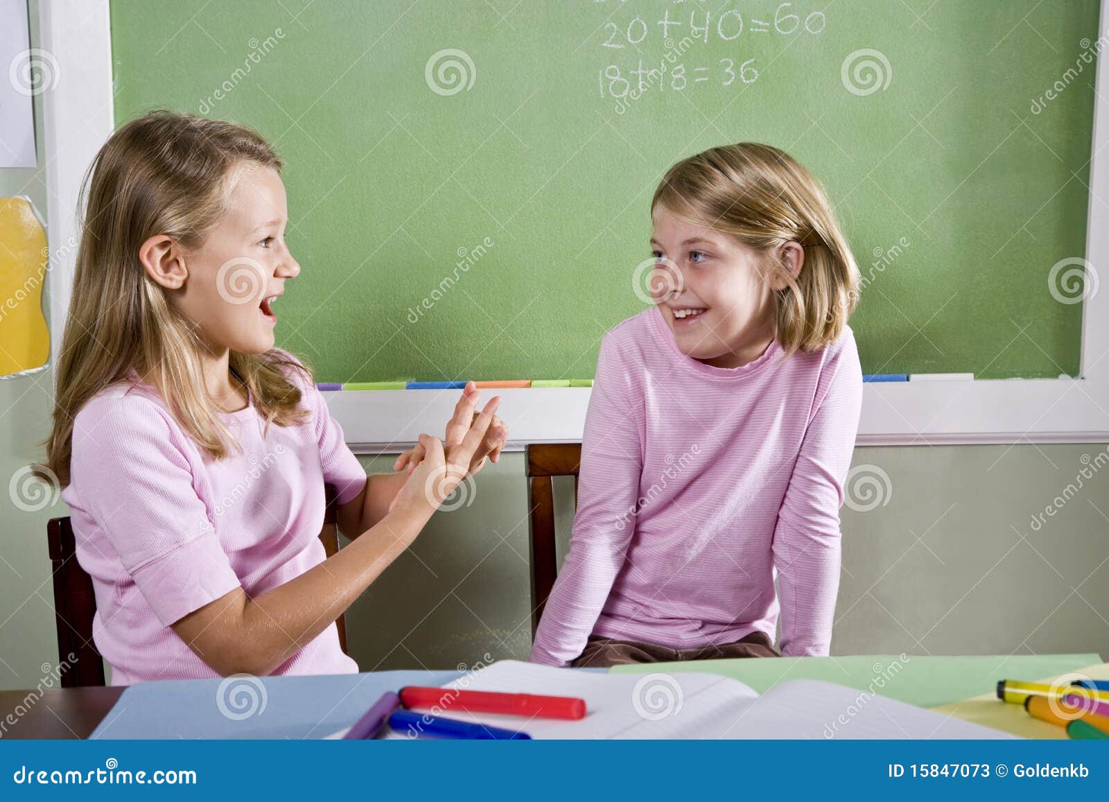 Friends in class talking stock image. Image of schooling 15847073