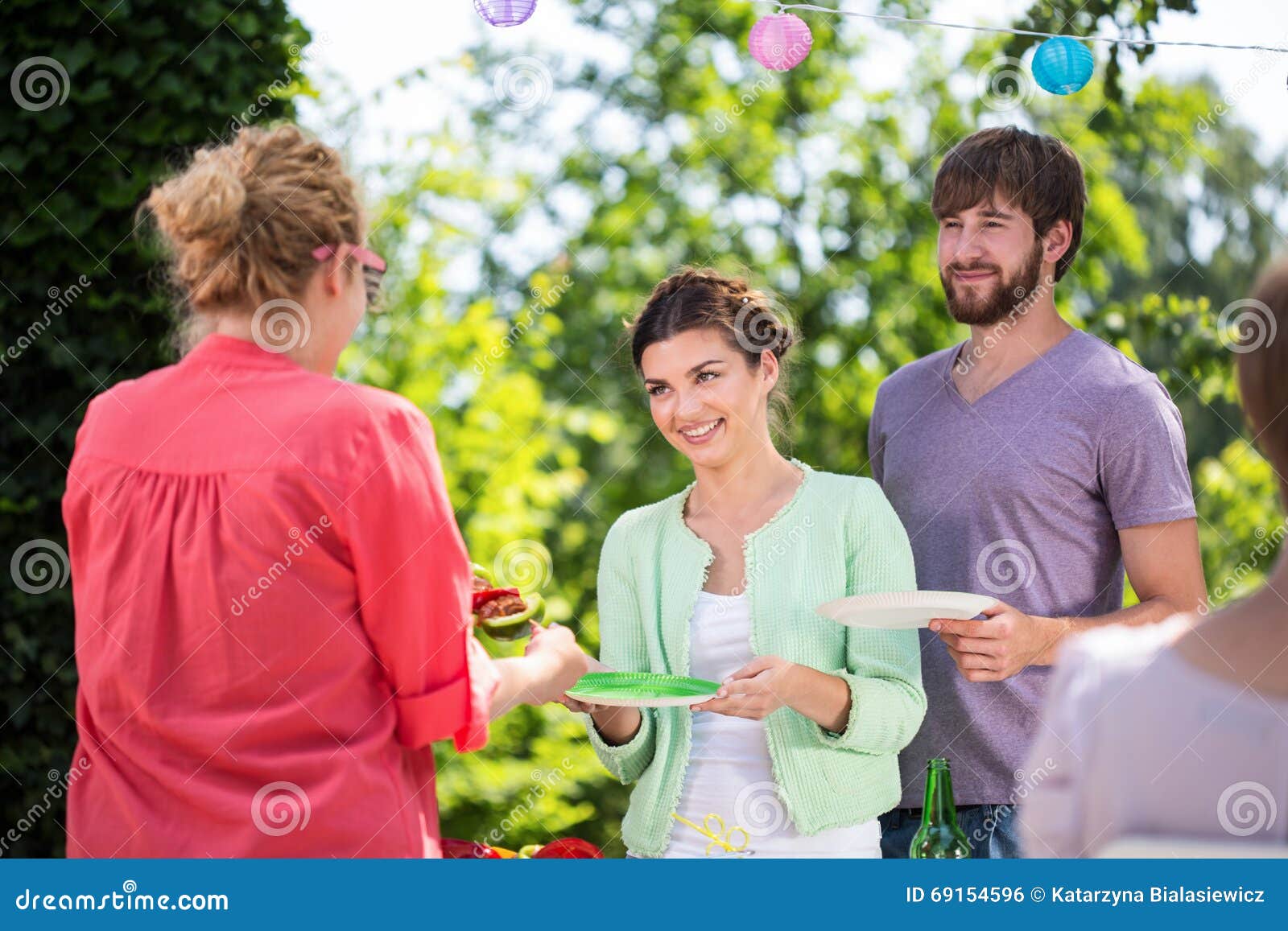 Friends eating outdoors stock photo. Image of afternoon 69154596