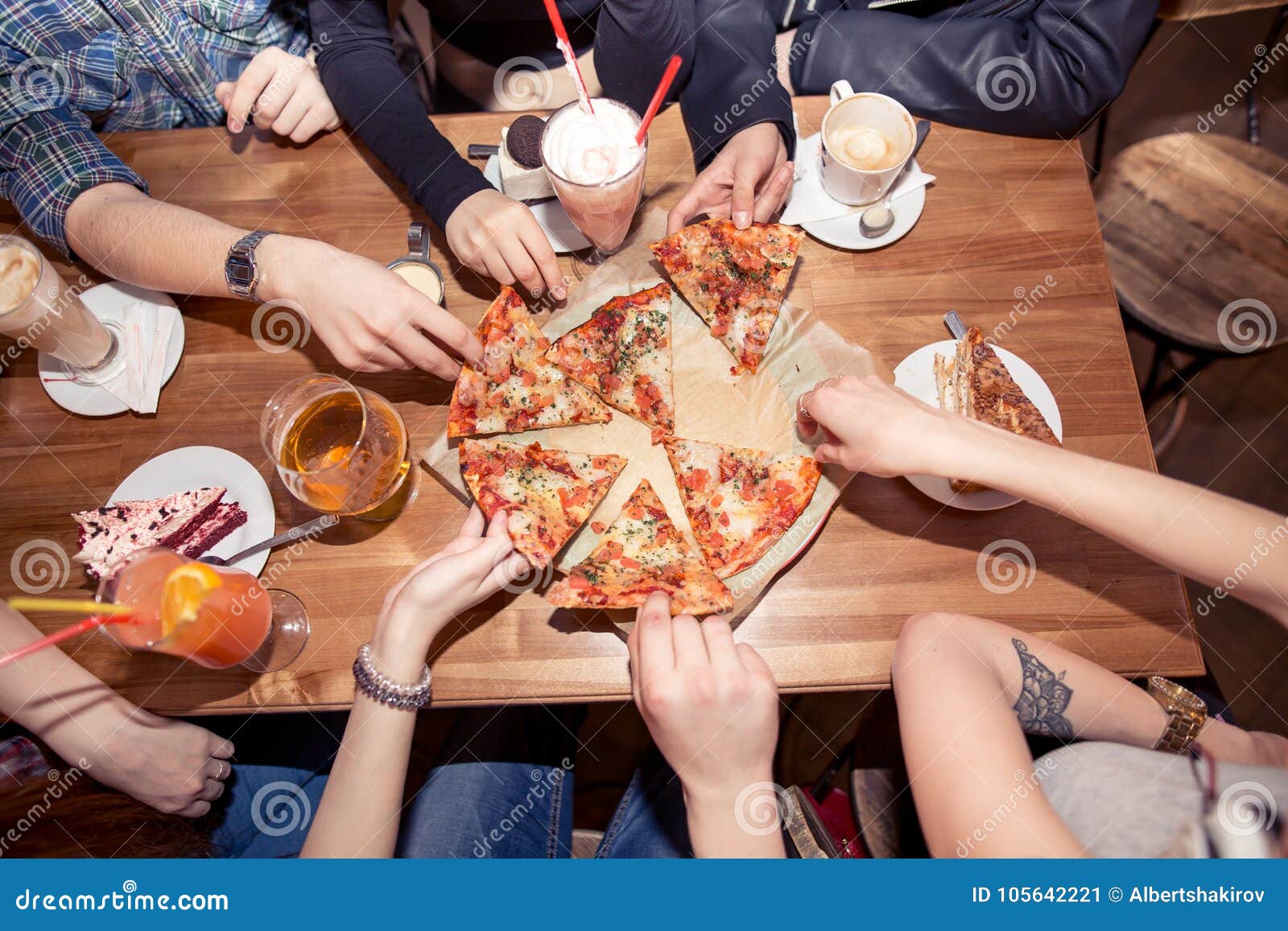 close-up image, A group of friends eating pizza in the party together. New  year party, Birthday party, Pizza party at home Stock Photo - Alamy