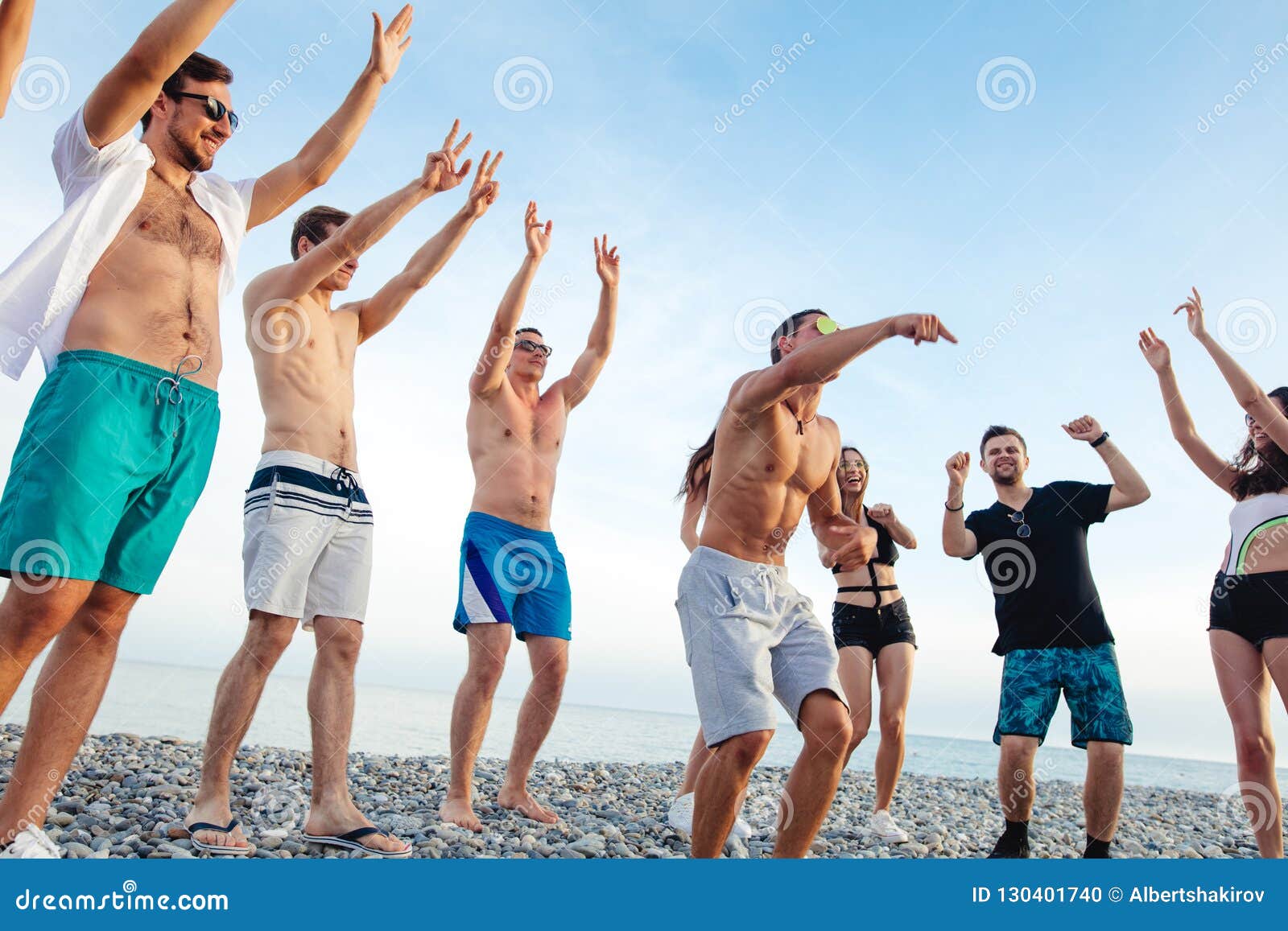 Friends Dance on Beach Under Sunset Sunlight, Having Fun, Happy, Enjoy ...