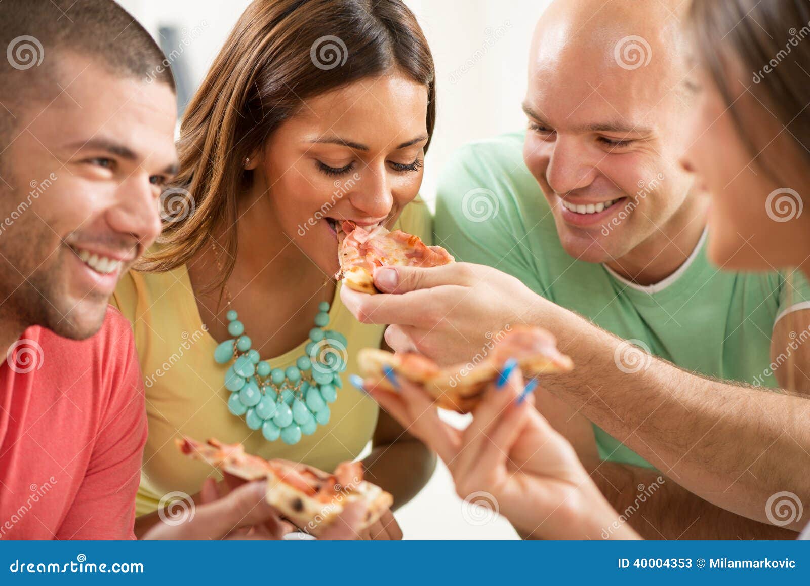 Happy Friends hanging out Together and eating Pizza · Free Stock Photo