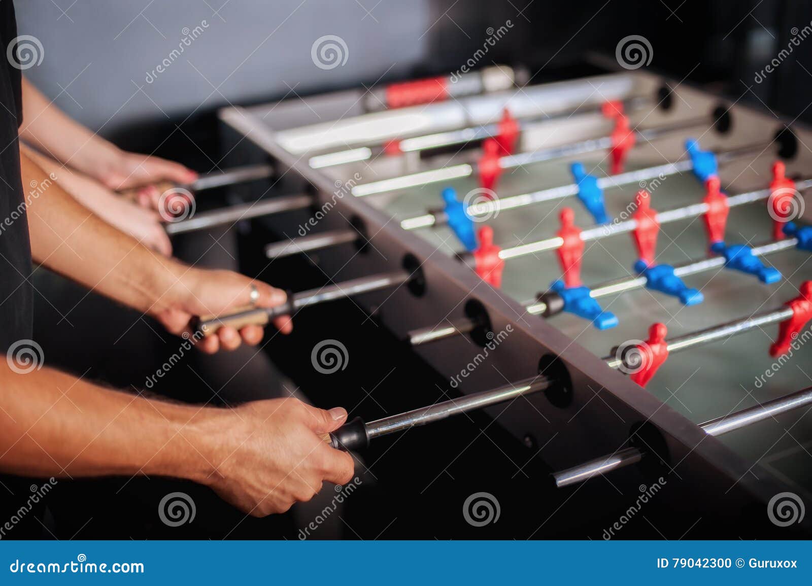 Friends Having Fun Playing Table Foosball Stock Photo Image of detail, match 79042300