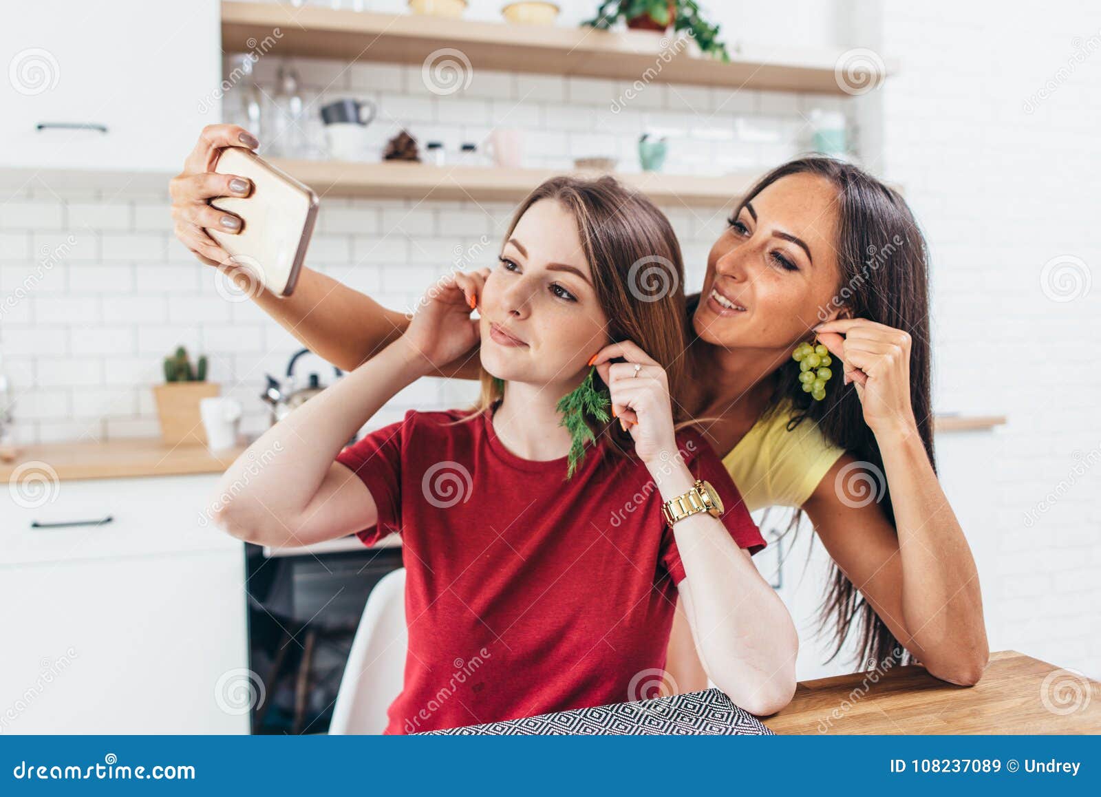 Friends in Kitchen Playing, Taking Selfie Use Fruits Like Earrings ...