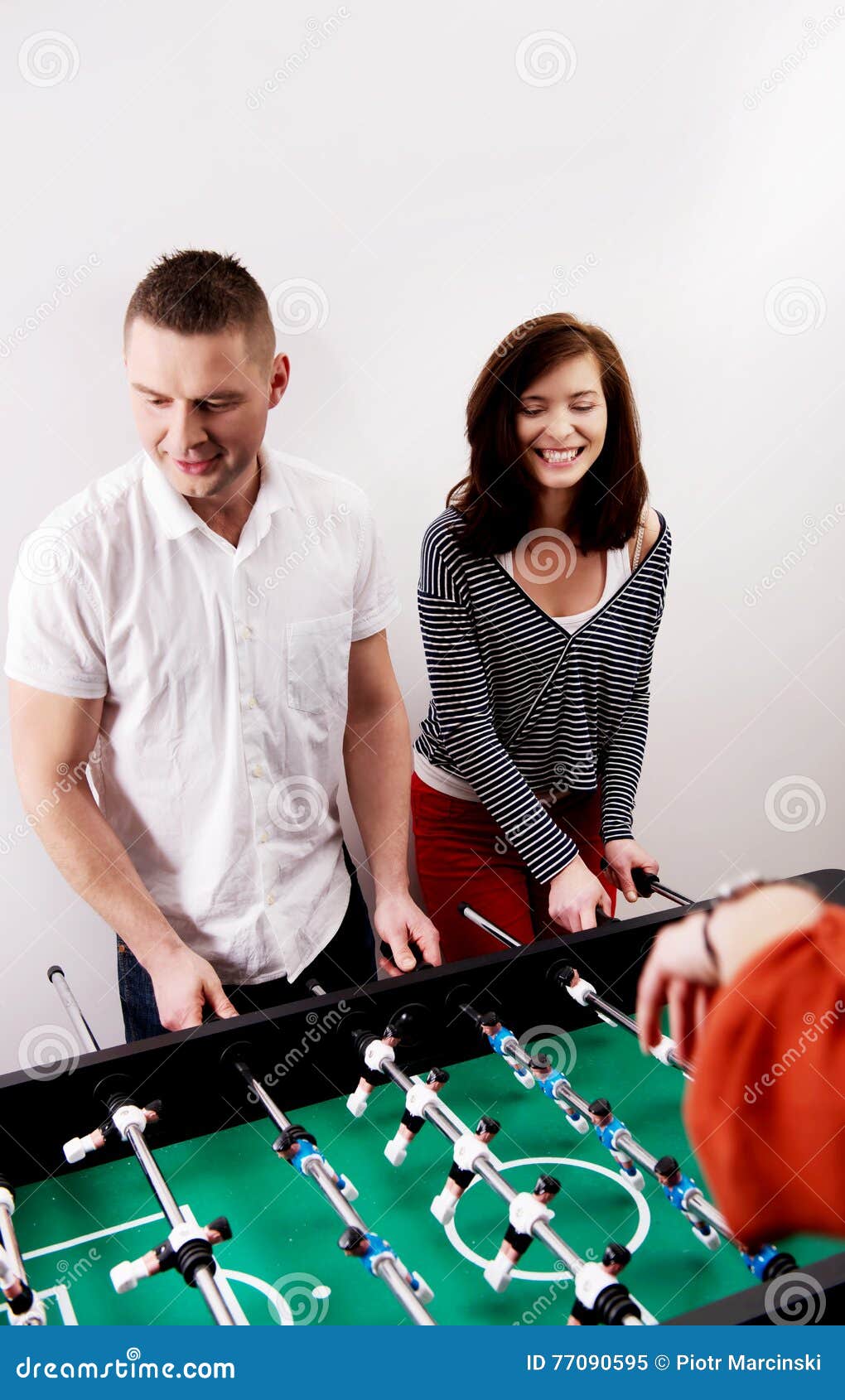 Friends Playing Table Football. Stock Image Image of caucasian, board 77090595