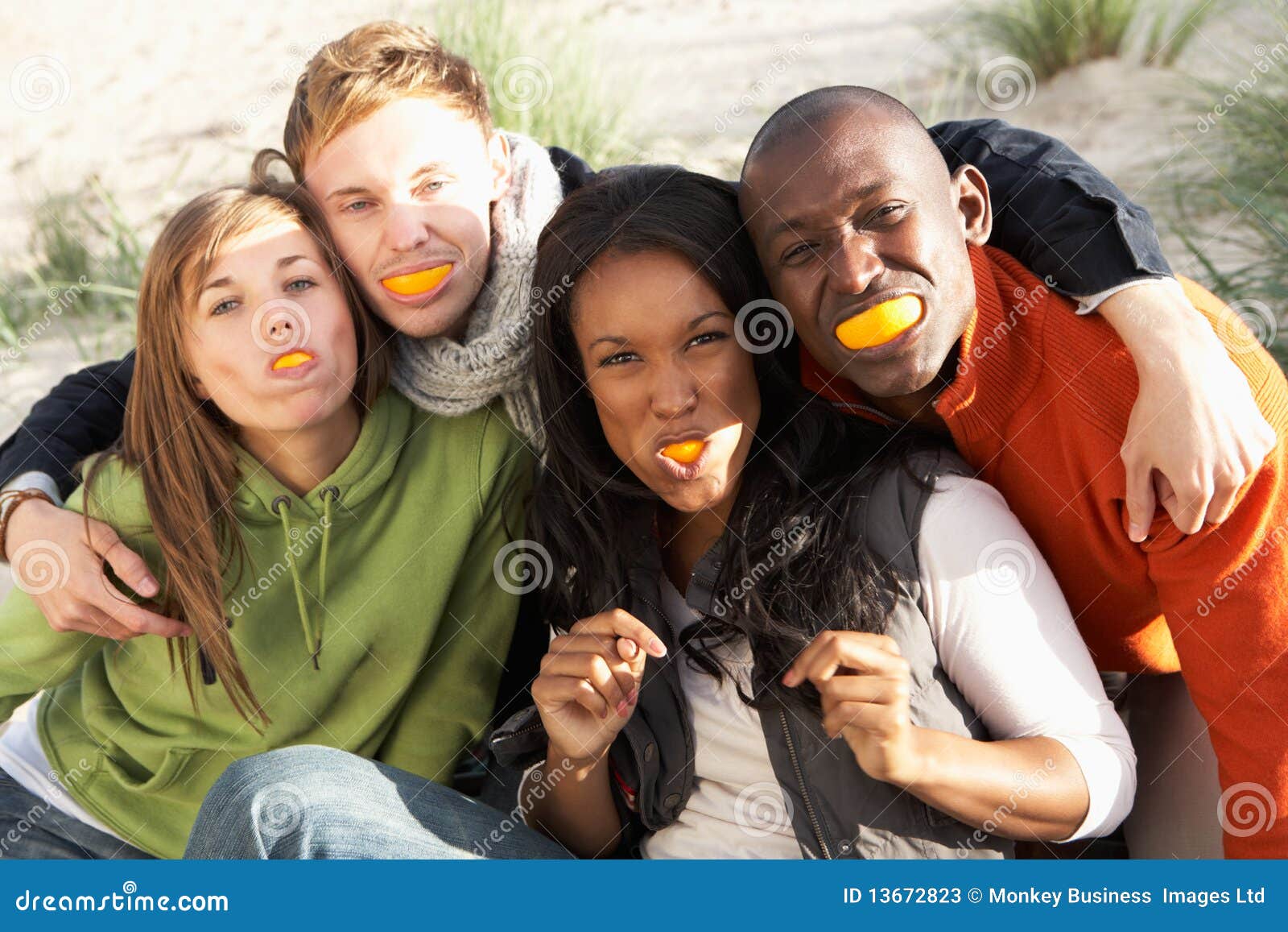 Friends Pulling Funny Faces On Beach Stock Image Image 13672823