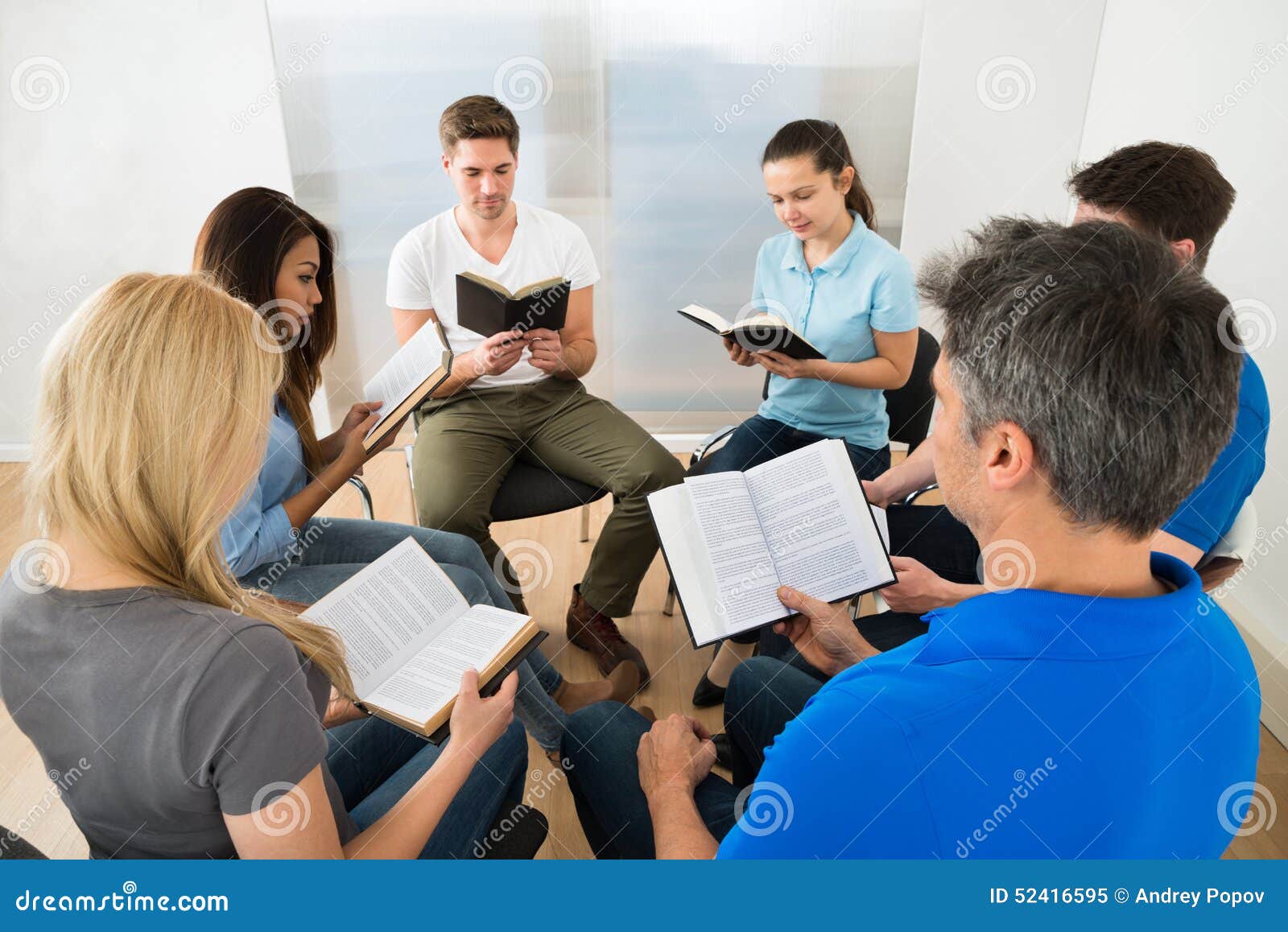 Friends reading bible stock image. Image of casual, friend 52416595