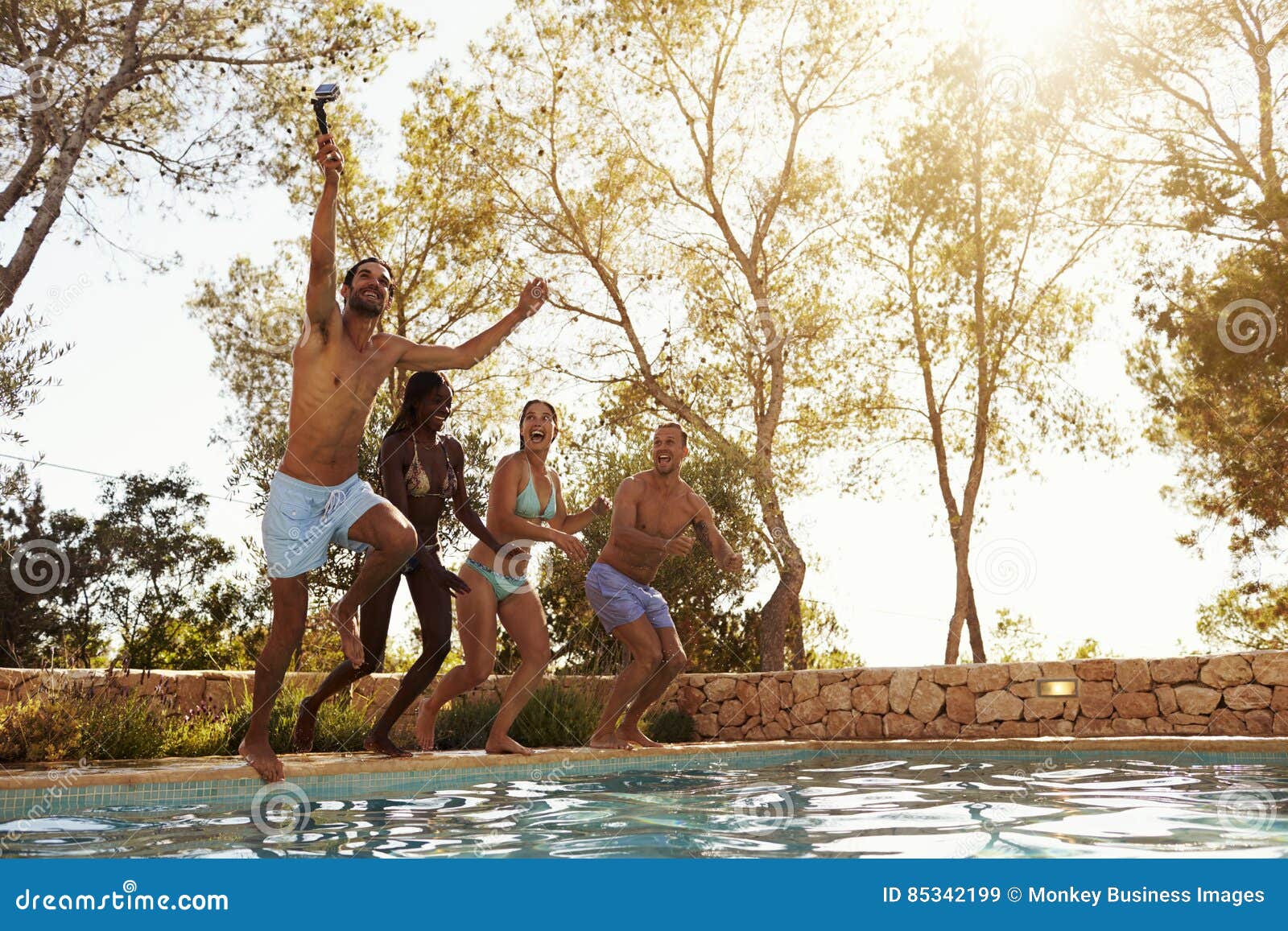 Friends on Vacation Taking Selfie of Jumping into Pool Stock Image ...