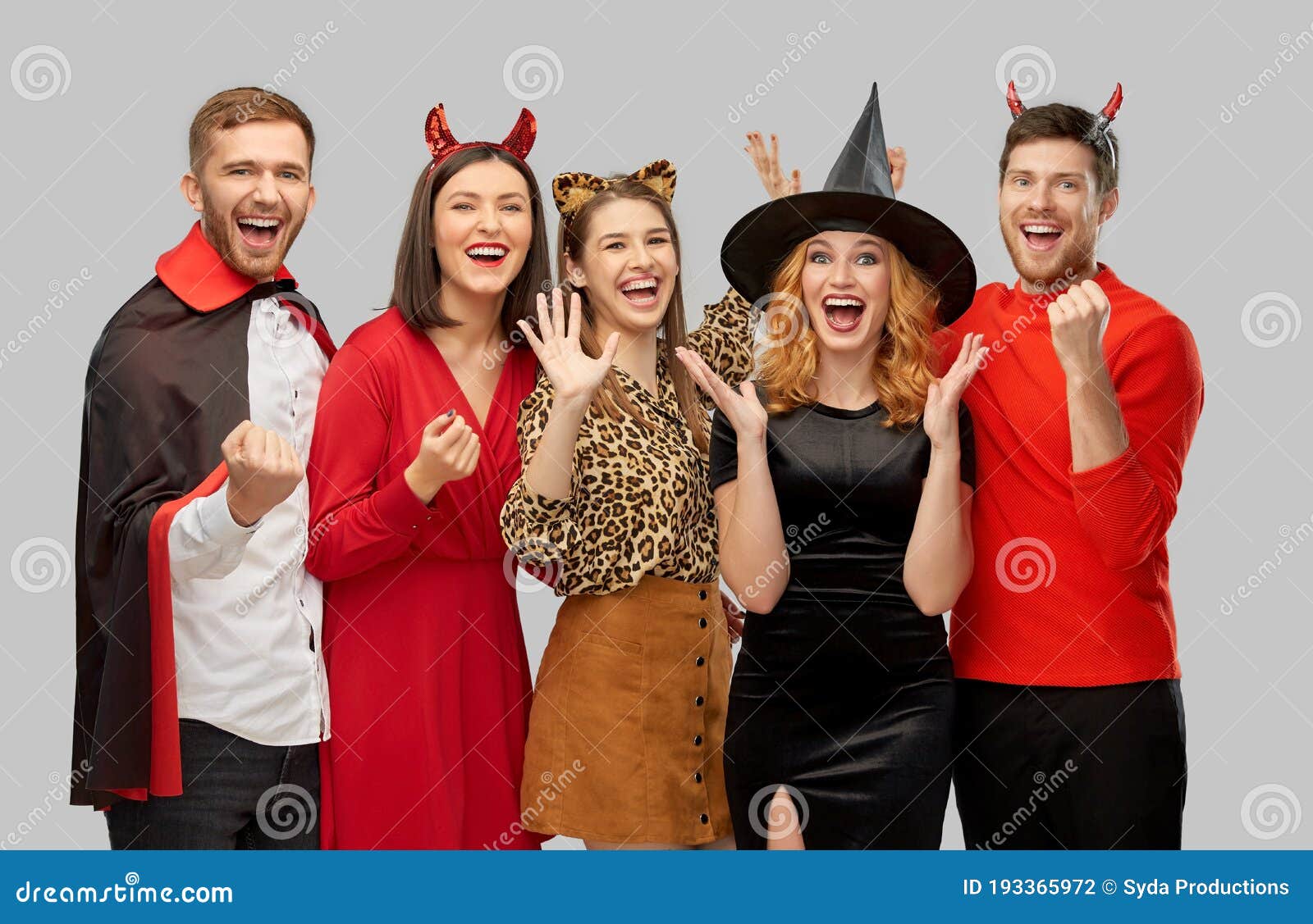 Happy Friends in Halloween Costumes Over Grey Stock Photo - Image of ...