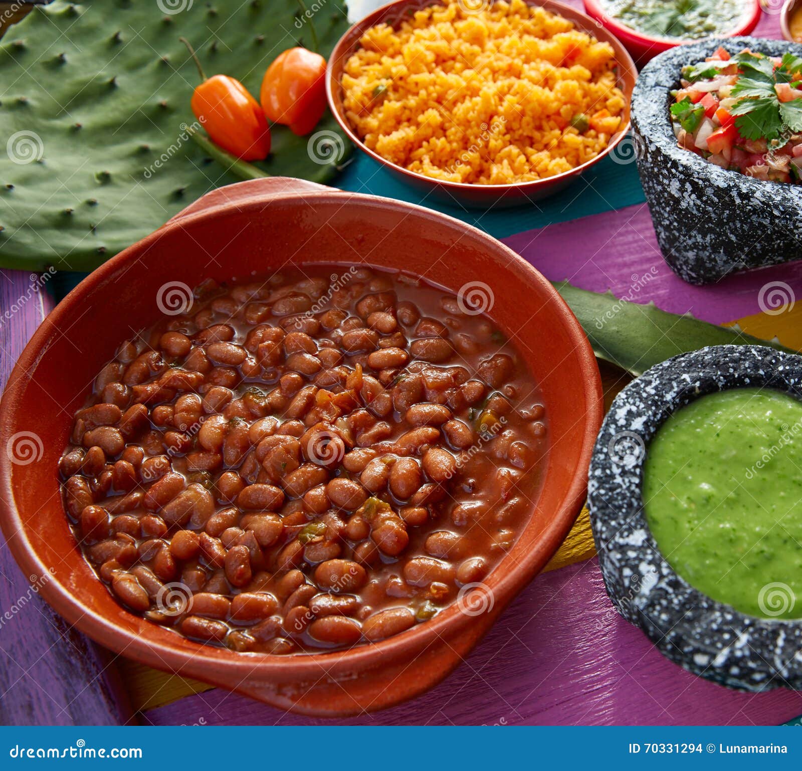 Frijoles Mexican Beans with Rice and Sauces Stock Photo - Image of