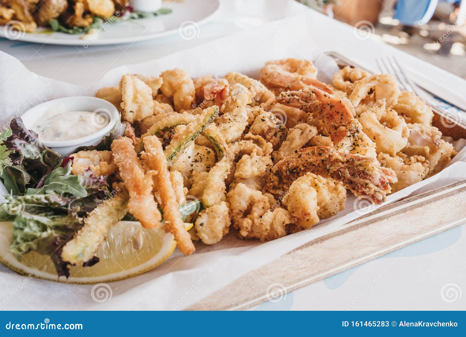 Frito Misto Fried Seafood on a Wooden Tray in a Restaurant Stock Image ...