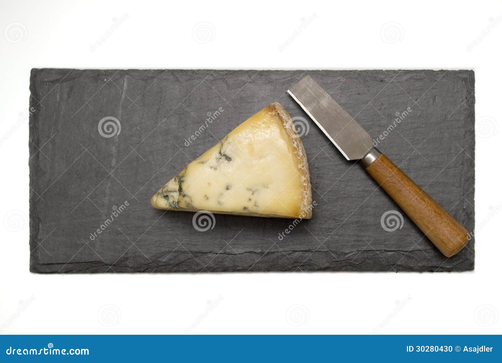 Fromage Sur Le Panneau D'ardoise Avec Le Couteau Photo stock Image du
