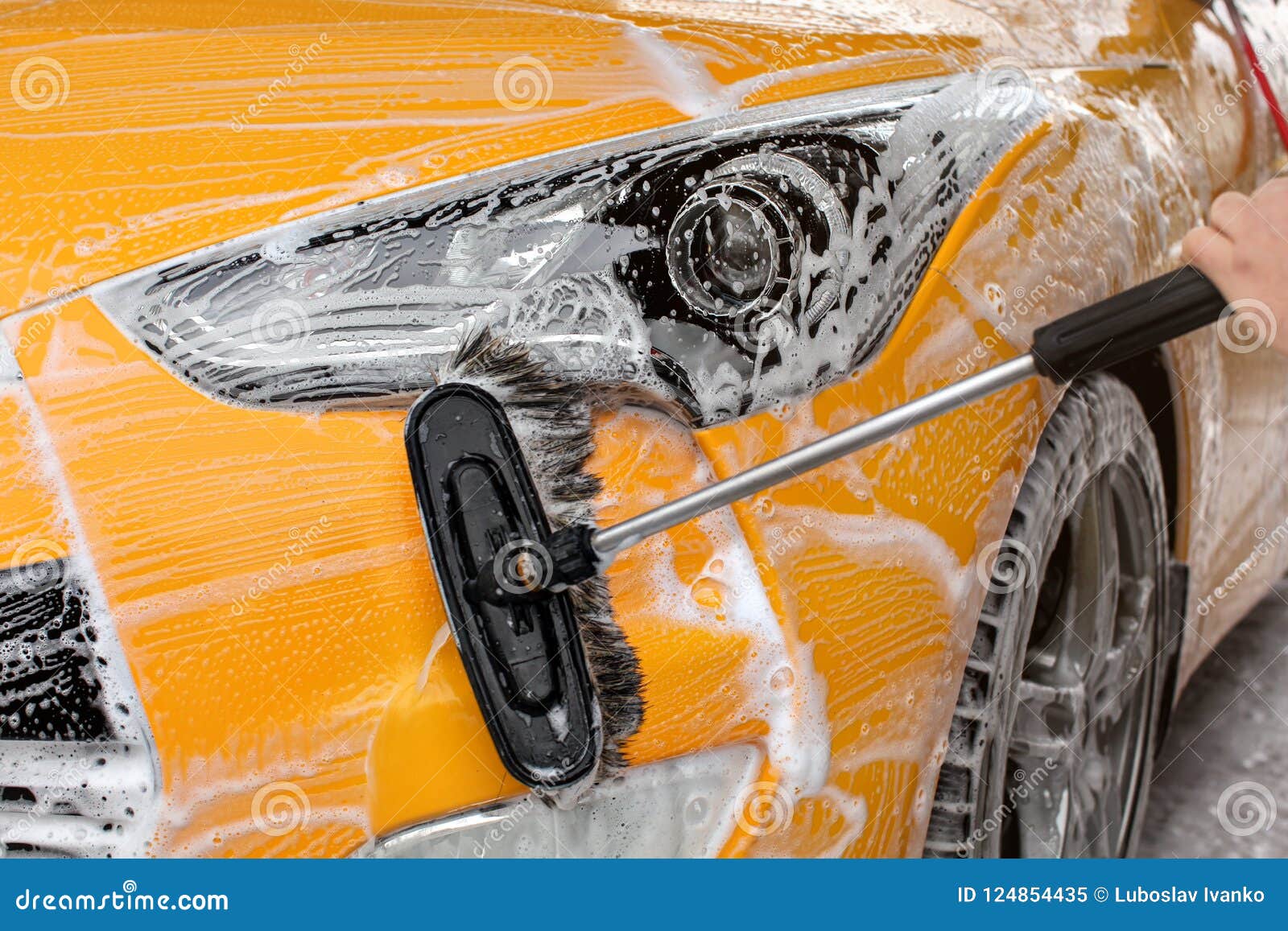 Soap Bubbles On Wheel Before Car Wash RoyaltyFree Stock
