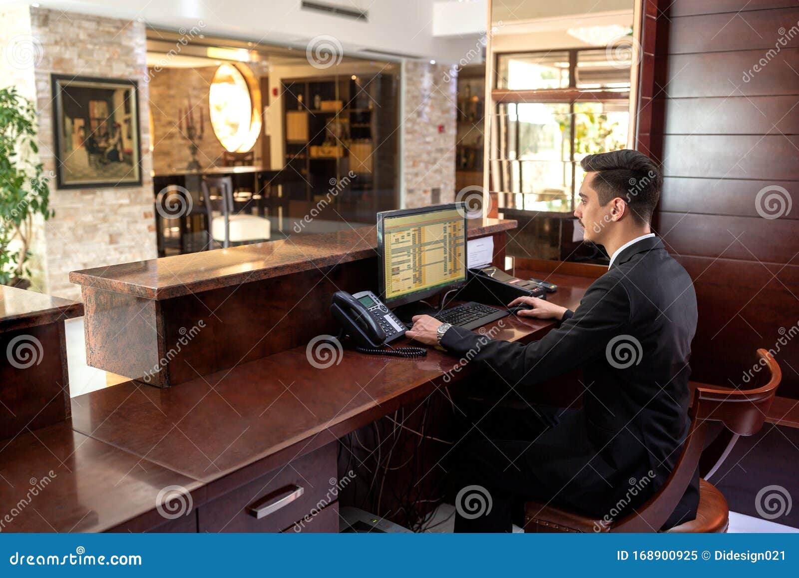 Front Desk Hotel Receptionist Working Stock Image Image Of