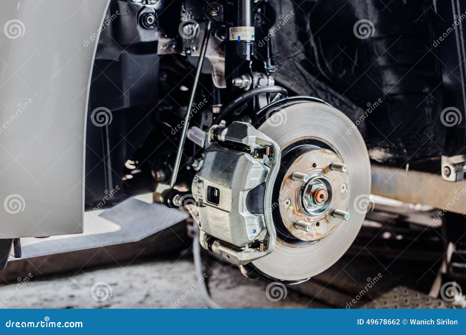 Front Disc Brake on Car in Process of New Tyre Replacement. Stock Photo Image of repair, bolts