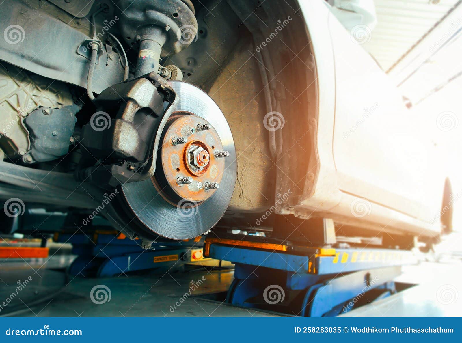 Front Disc Brakes and Calipers that Remove the Wheels of a Car in the